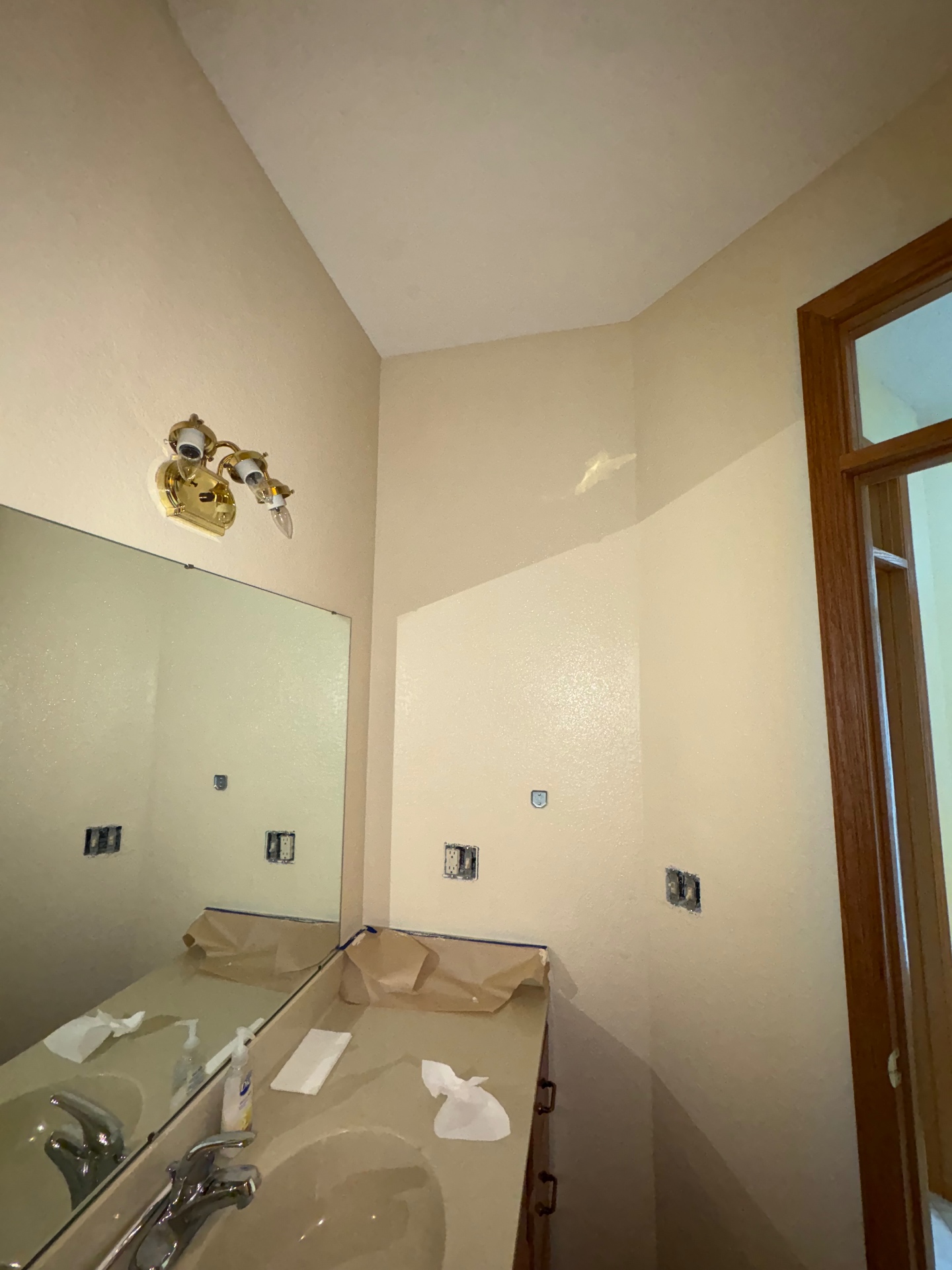 Vanity Wall Repaint — Fresh neutral tones prepped and cut in around fixtures and trim.